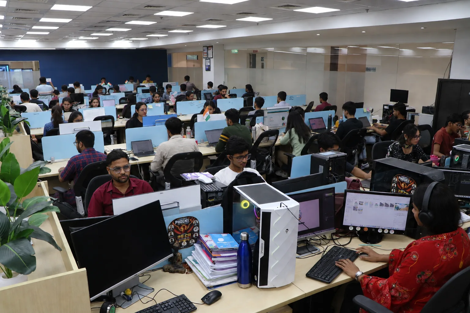 SNL team members working at their desks at the Development Center, B.N Corporate Park, Noida Sector 135